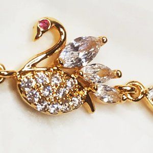 1Gold Goose Bracelet with crystal  and small pearl earrings